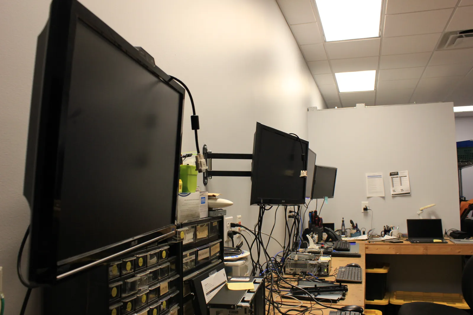 Computer Ties technician bench with dual monitors and workstations