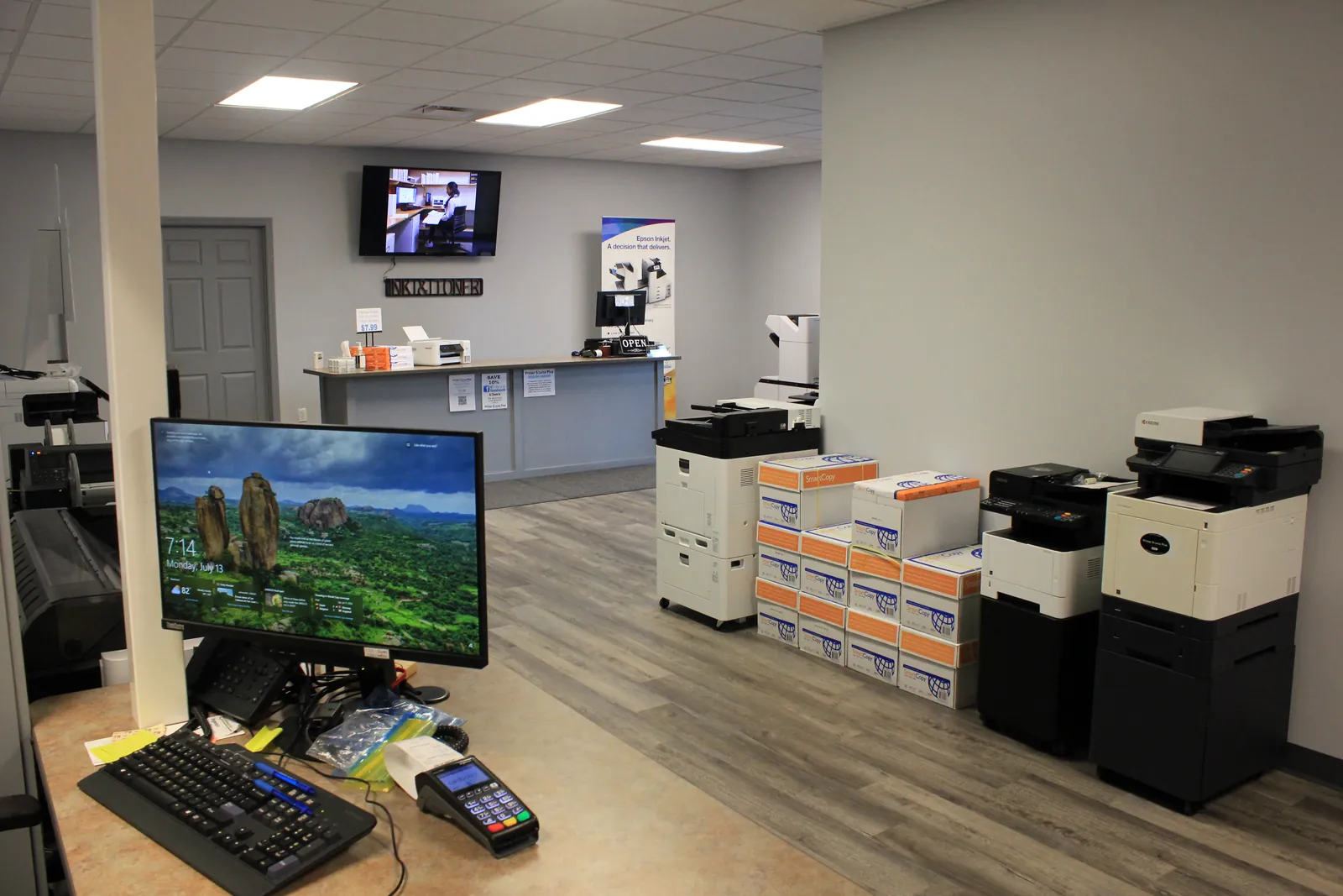 CTi Tech Plaza showroom service counter with workstation and copiers